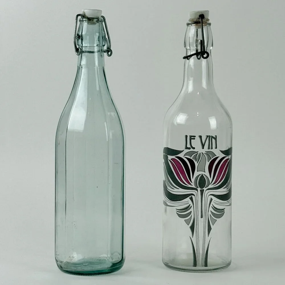 Art Nouveau Le Vin Wine Bottle Set Ceramic Topper Glass Pair 12.5”